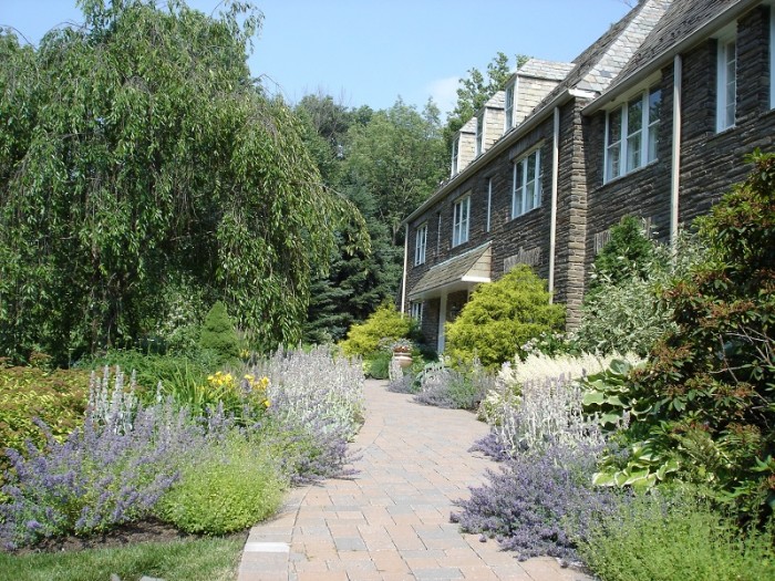 Picture of a landscaped pathway lined with flowers