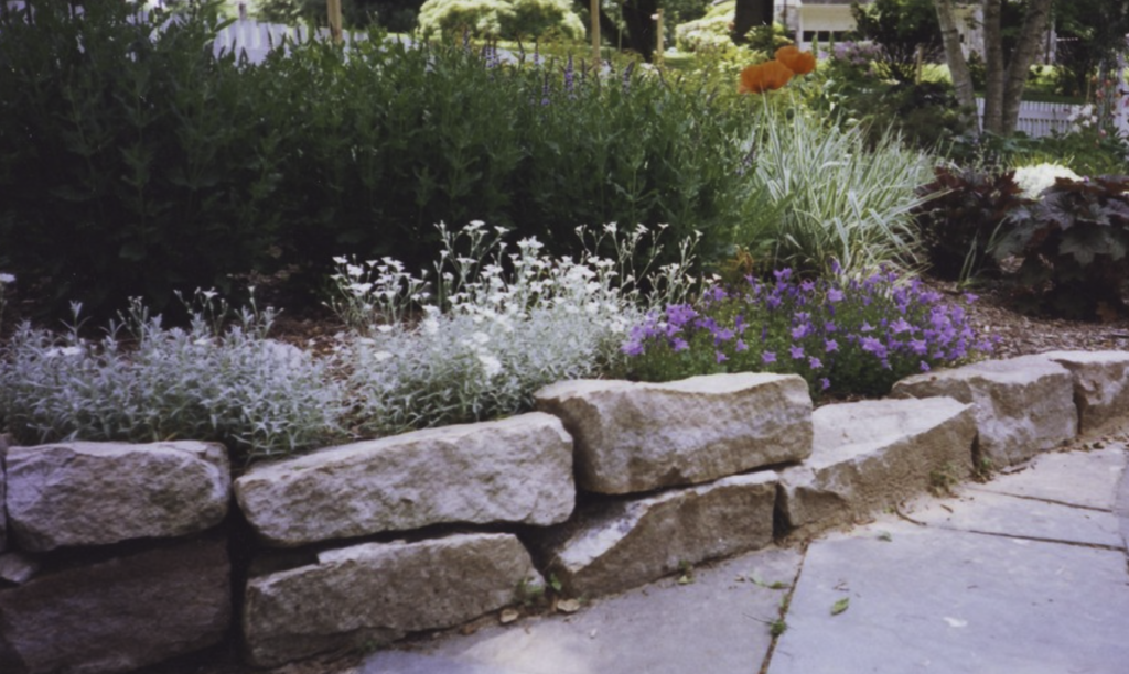 Retaining wall with bright, natural flowers